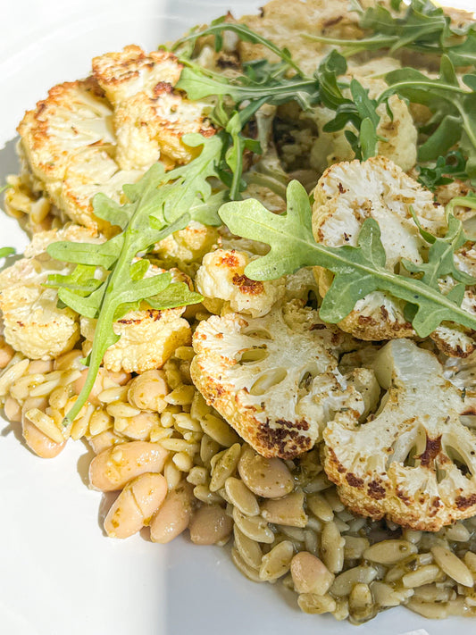 Roasted Cauliflower over Orzo & Pesto